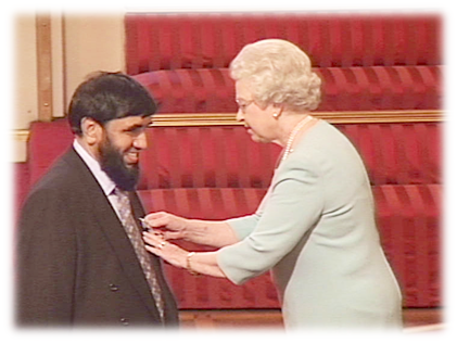 Queen awarding Barrister Kutubbin Ahmed Shikder